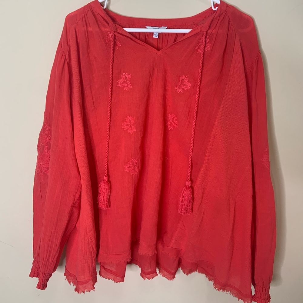 red flower present top